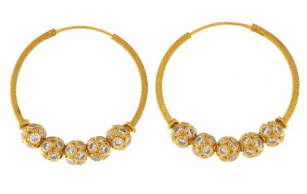 Timeless Glamour: The Allure of Gold Hoop Earrings for Women